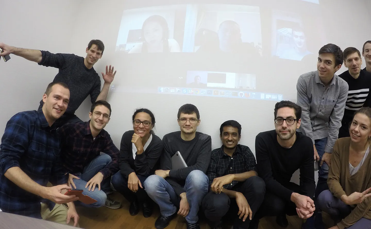 ChartMogul all hands, 11 in the office and 4 on Skype (projected overhead).